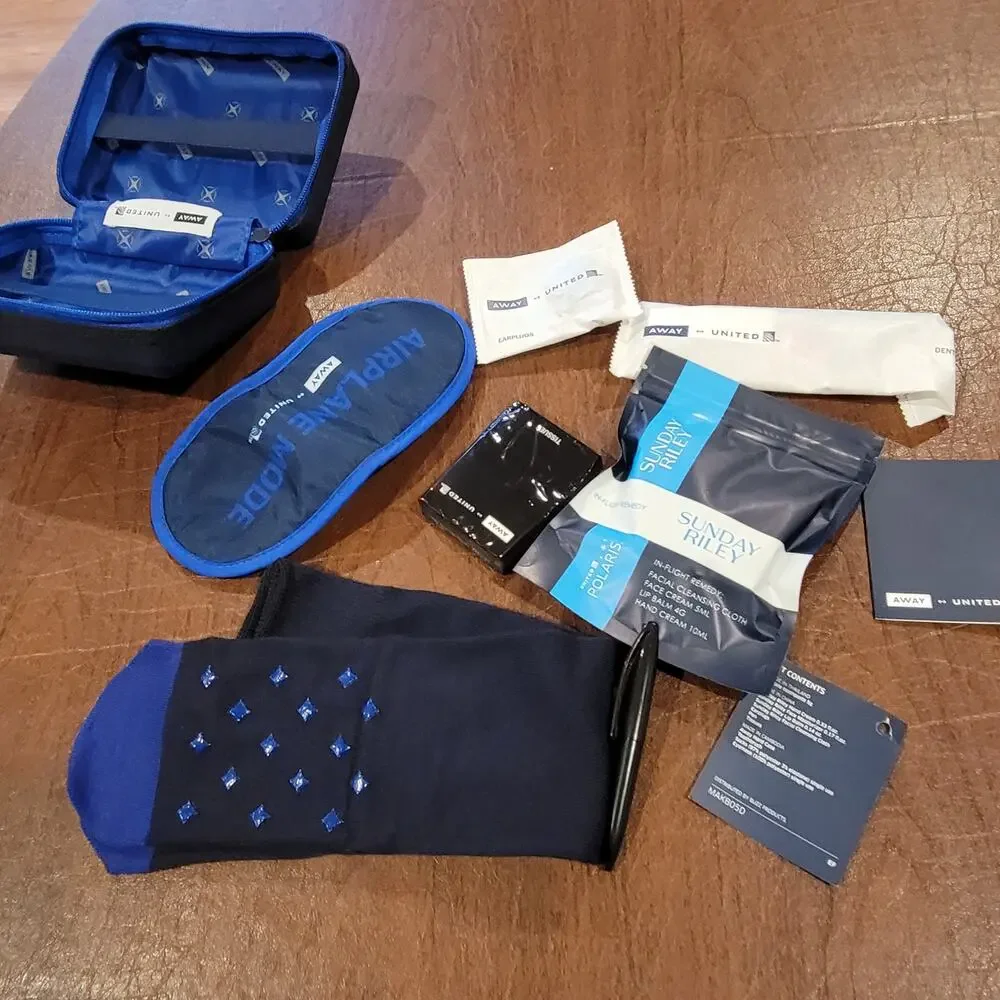 New AWAY Travel The Mini Suitcase Toiletry Case United Polaris Amenity Kit Pouch
